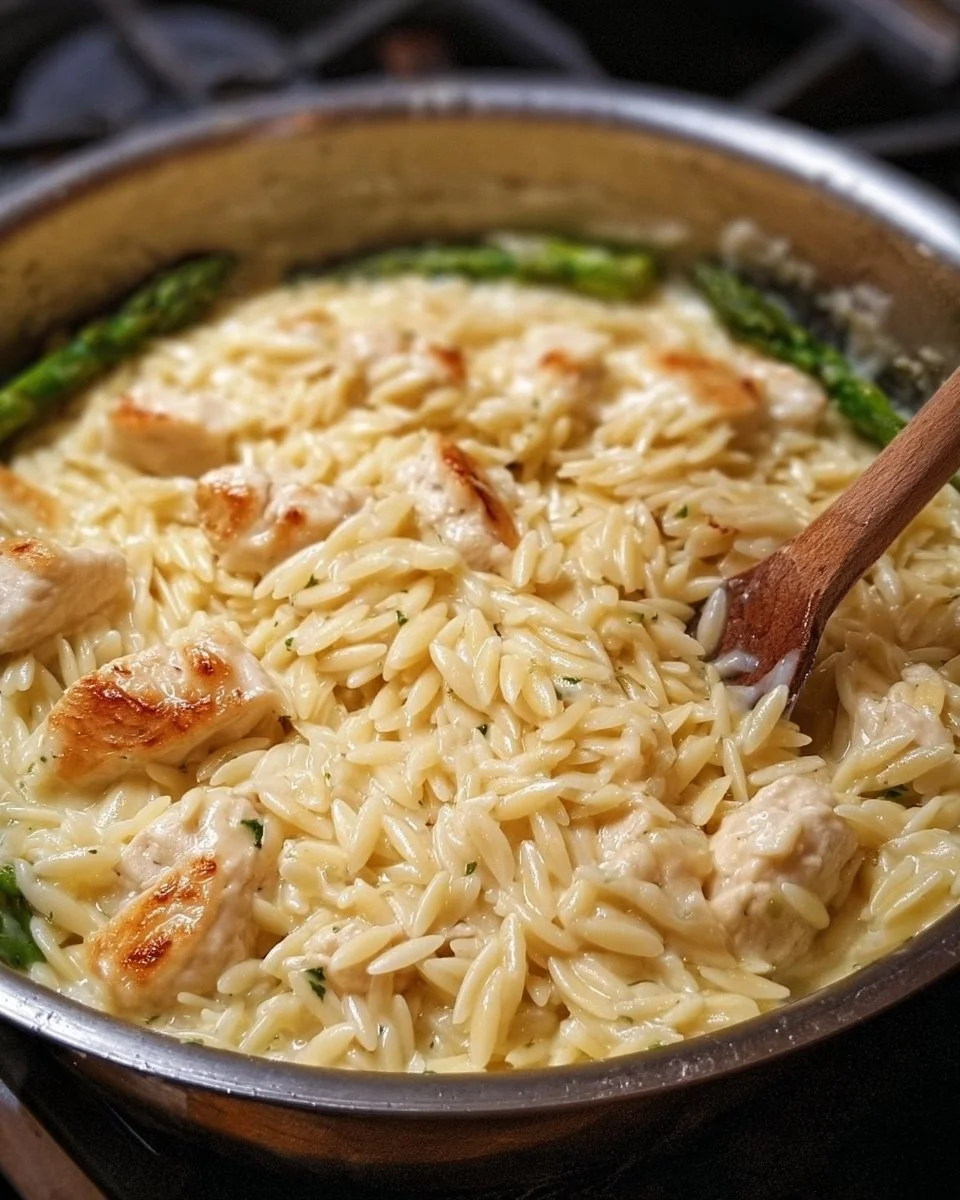 Creamy Parmesan orzo with fresh herbs served in a bowl