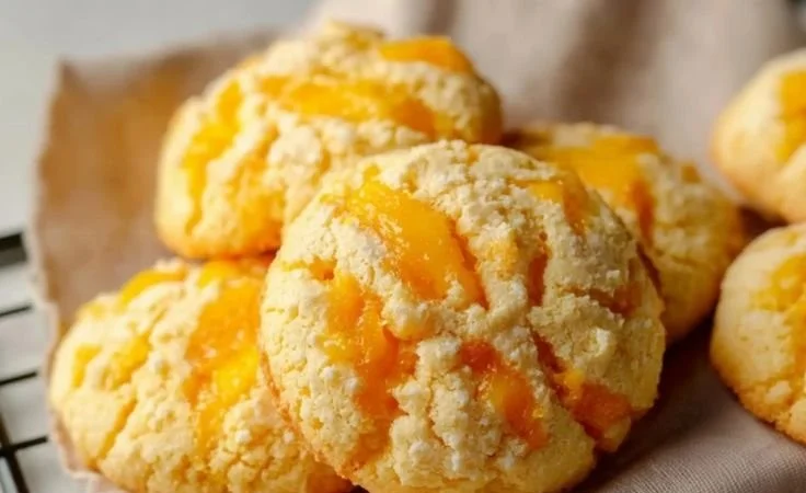 Delicious homemade mango cookies on a rustic wooden table